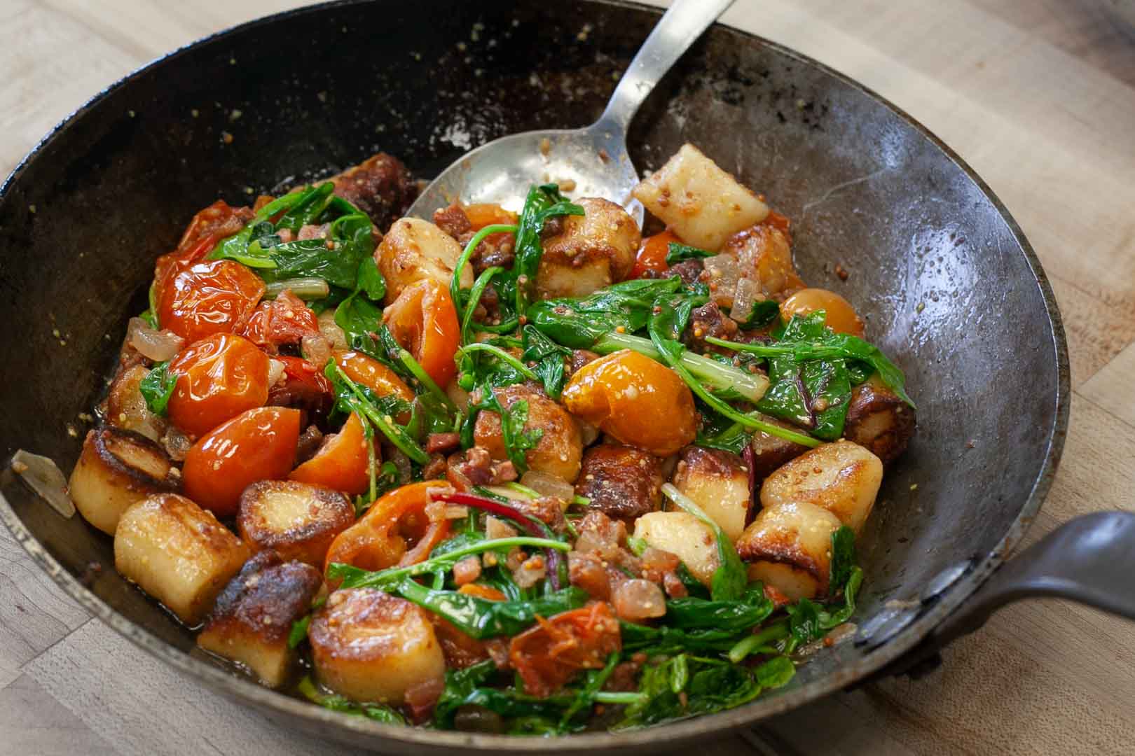 Ricotta Gnocchi With Guanciale Vinaigrette & Vine Ripened Tomatoes